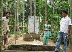 CML members inspecting the Biogas-bioslurry plant at and interacting with beneficiary